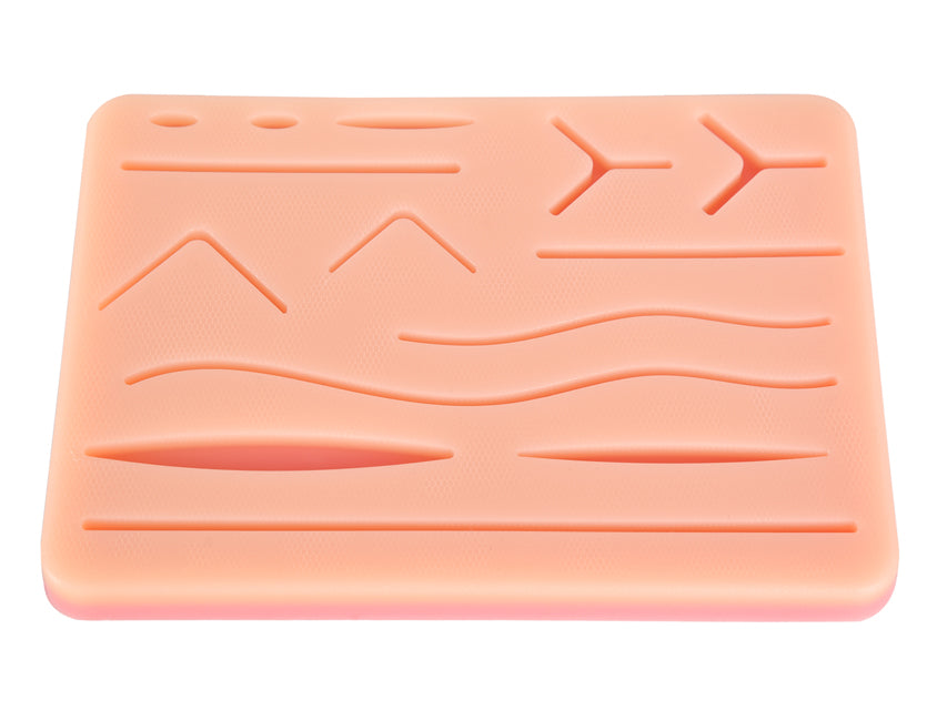 COUSSIN D'EXERCICE DE SUTURE AVEC MAILLE